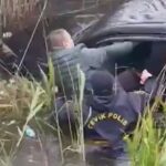 Невероятное спасение: полицейские вытащили водителя из утопающей машины в Баку